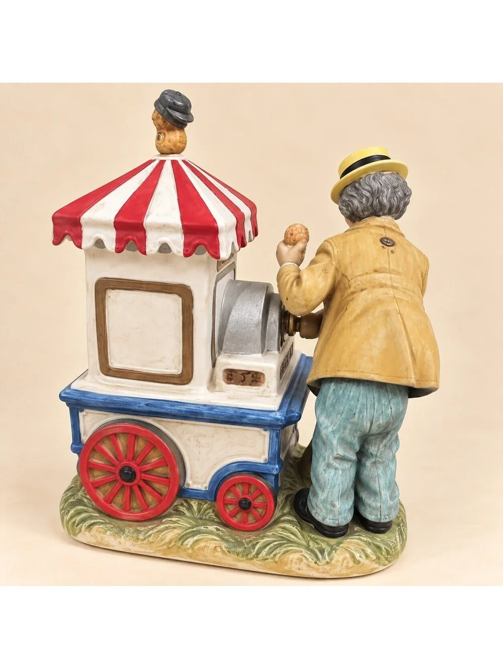 Vintage Peanut Vendor Figurine, Melody in Motion Musical Porcelain Non Working